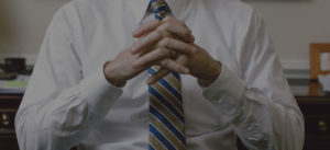 businessman with clasped hands